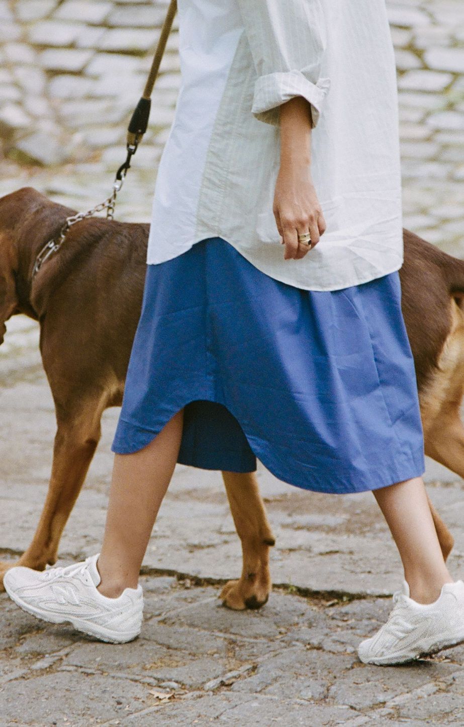 Person wearing new balance 204s